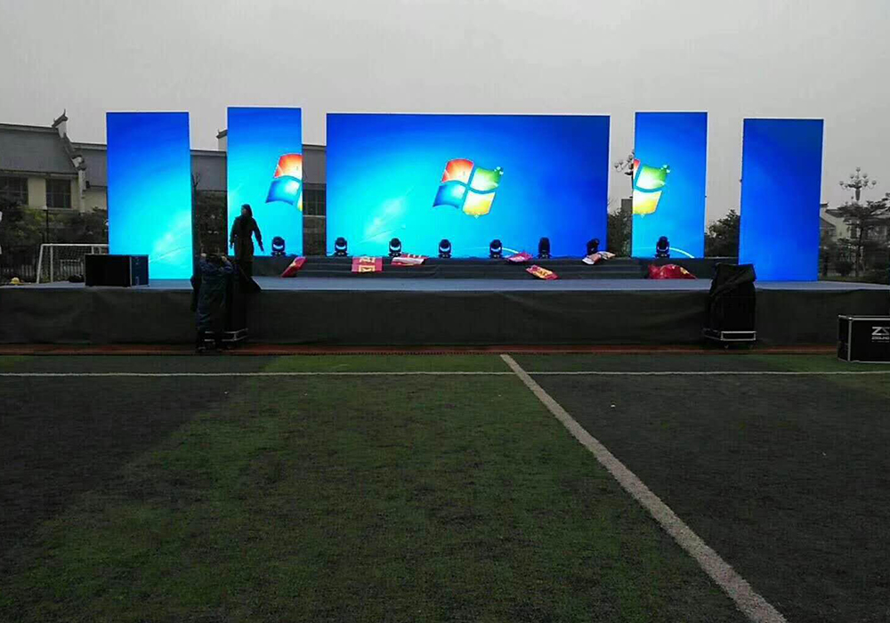 Outdoor Event Setup with LED Backdrop